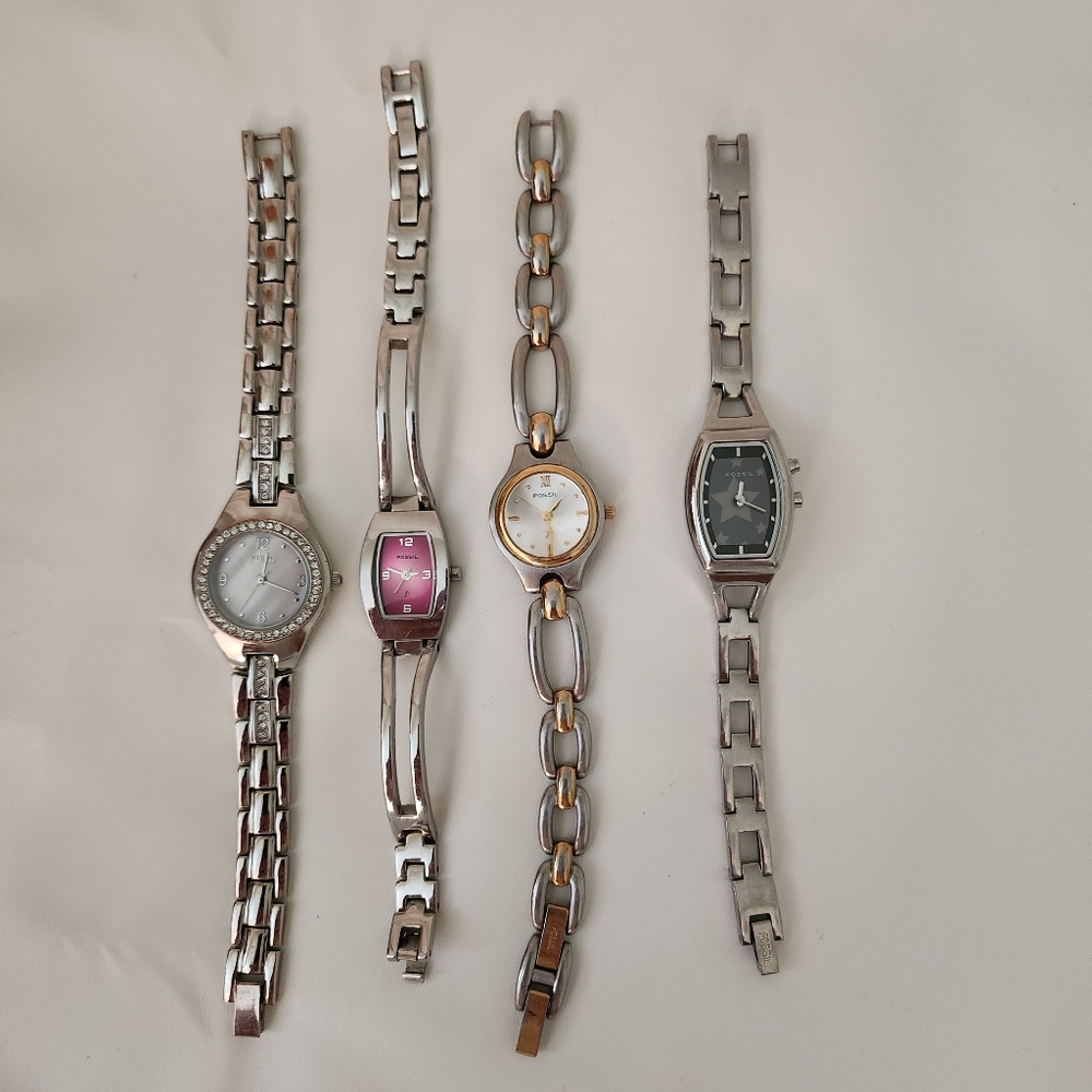 Fossil 3 of em and 1 Folio wrist watches